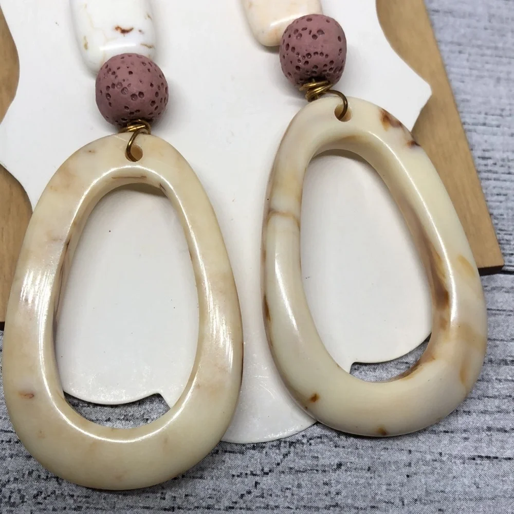 Handcrafted handmade statement style boho earrings long dangle drop.